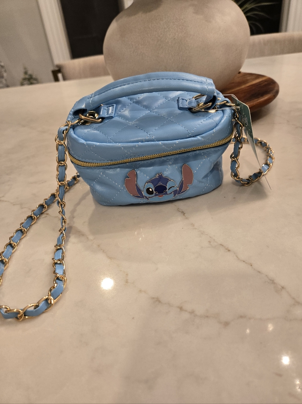 Light Blue Quilted Crossbody Bag with Stitch Character Accent